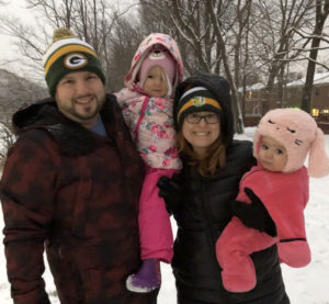 Emily Gardner with her family enjoying a fun snowday
